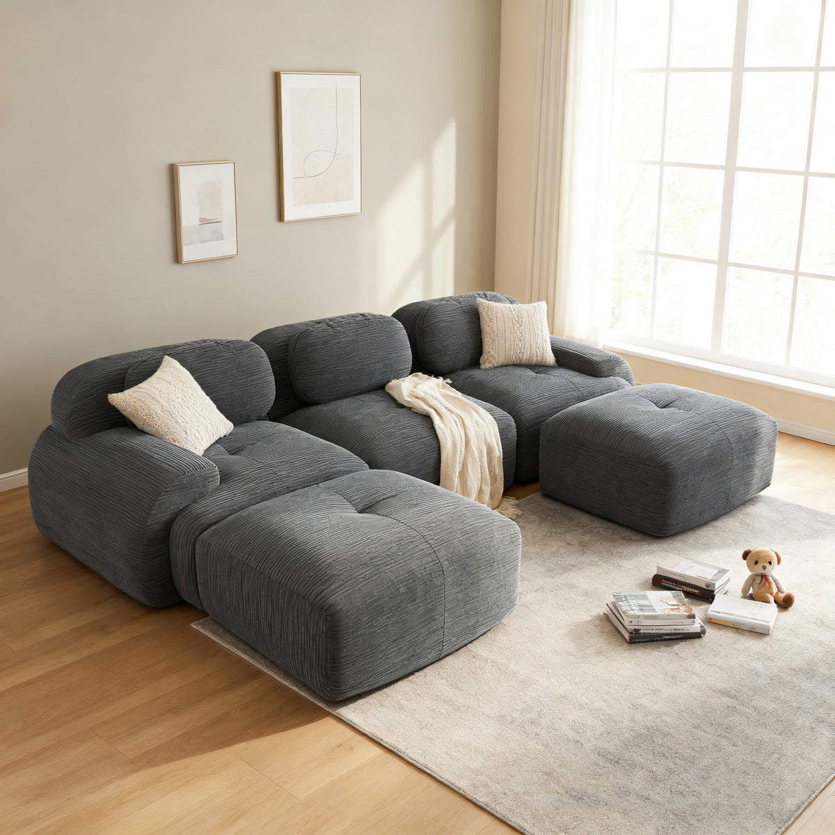 2-seater sofa bed in dark gray fabric with side pockets, modern convertible sofa