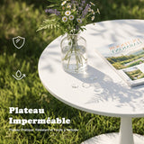 Ensemble de salle à manger de style scandinave comprenant une table ronde blanche et quatre chaises pliantes grises