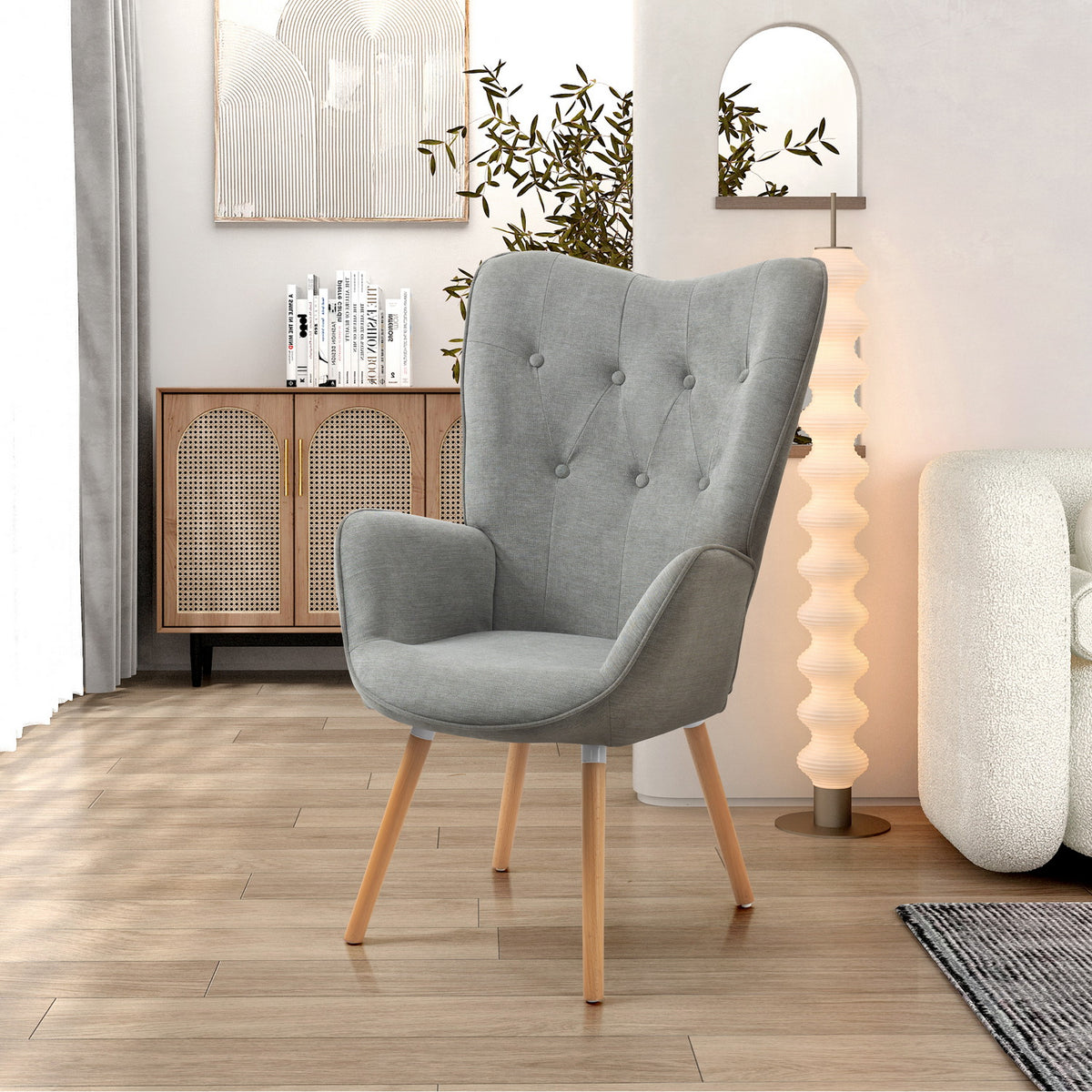 Fauteuil scandinave avec accoudoirs en tissu gris capitonné - KAS